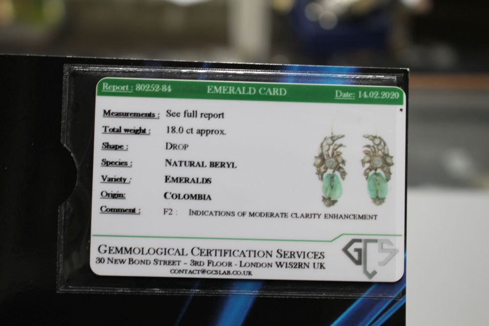 A pair of antique yellow metal, emerald and rose cut diamond set foliate earrings, with GCS certificate dated 14/02/20.